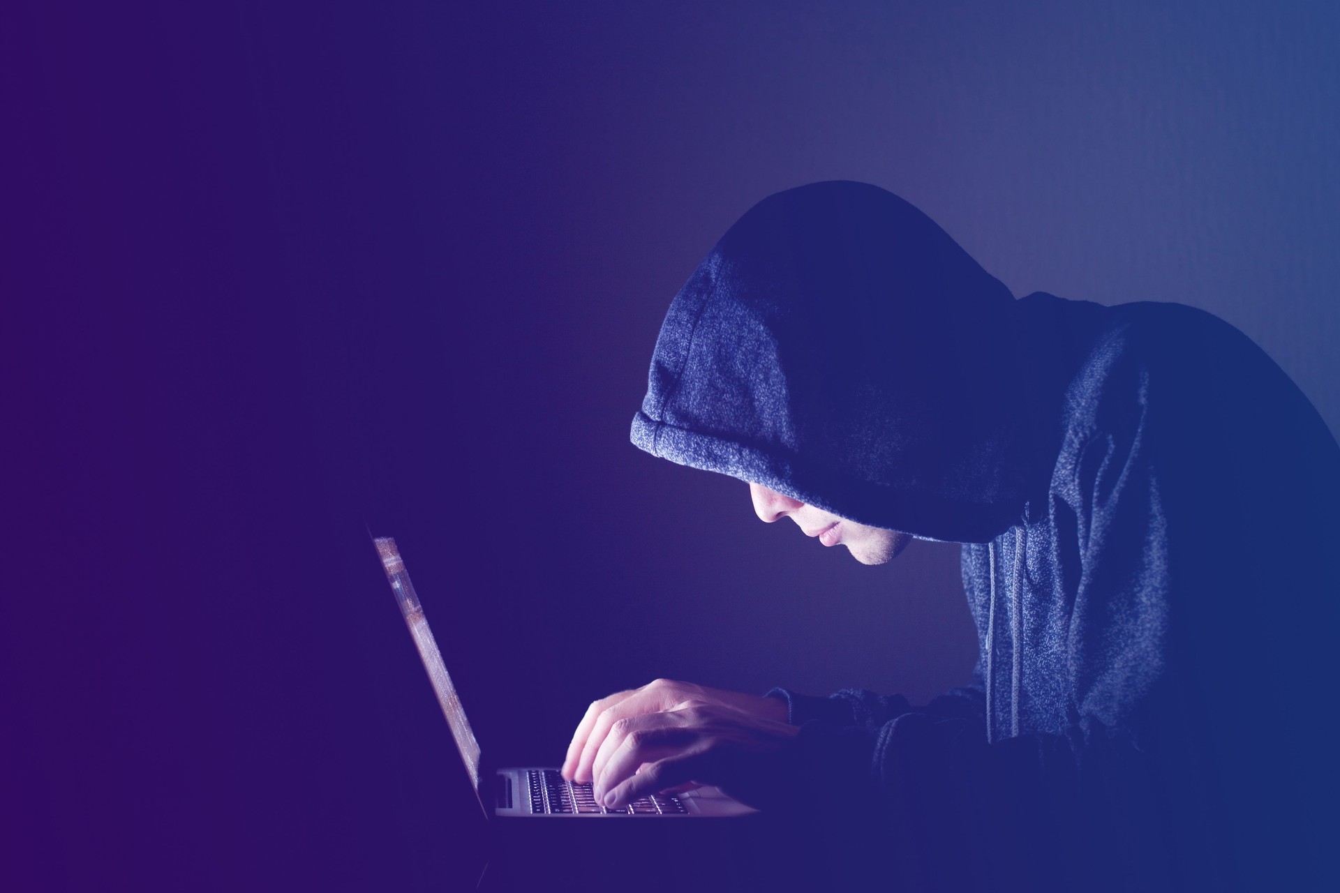 hacker with computer, cyber attack concept